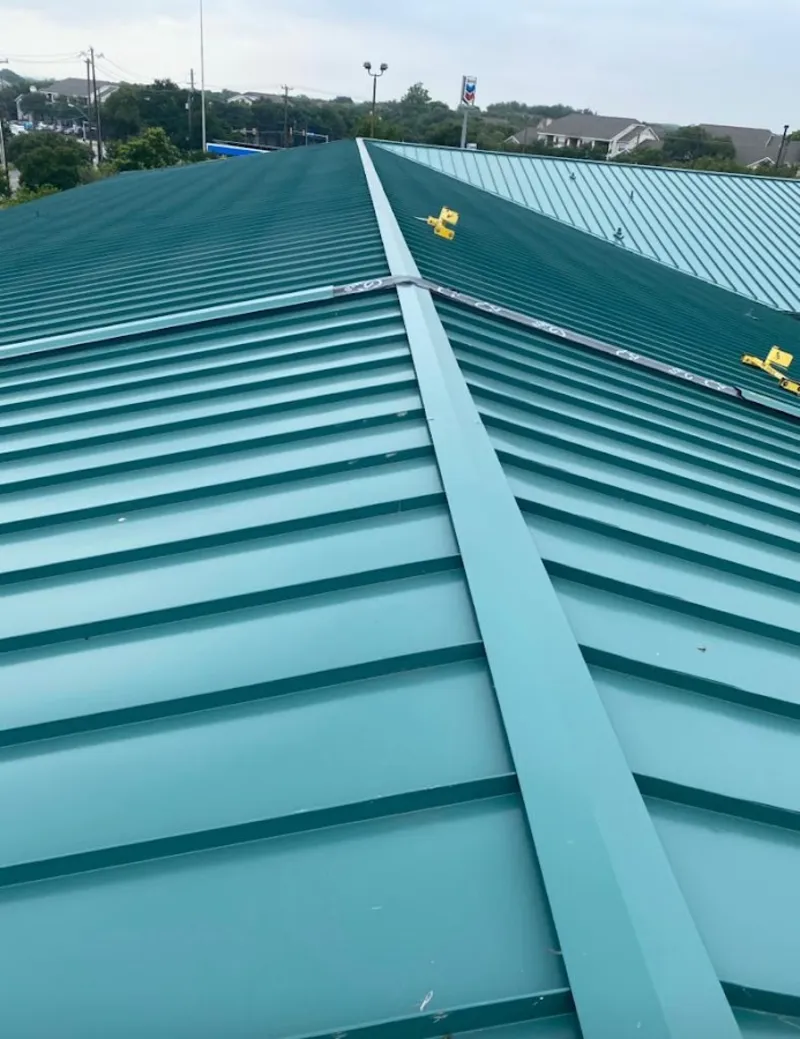 Green commercial metal roof ridge and valley for Metal Roof Repair in Benner
